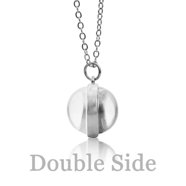 Silver chain with double-sided pendant.