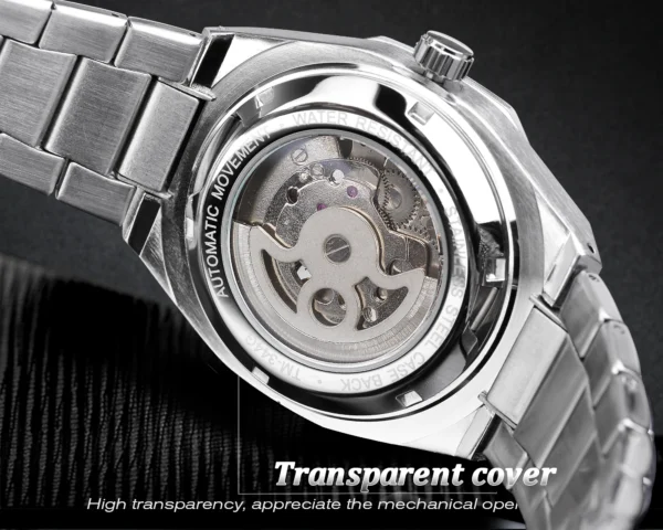 Silver watch with transparent back cover.