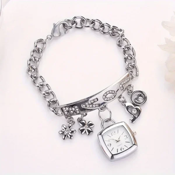 Silver charm bracelet with watch and "love" pendant.