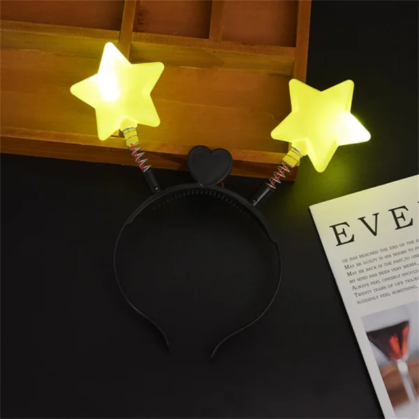 Black headband with two star lights.