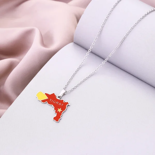 Tigray region map necklace on white background.