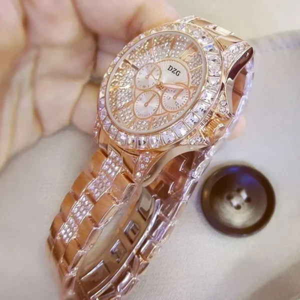 Rose gold watch with diamond accents.