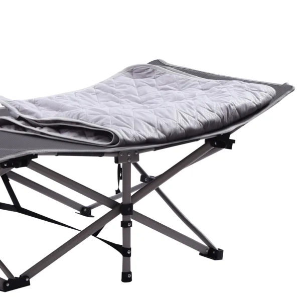 Gray folding camping cot with pillow.