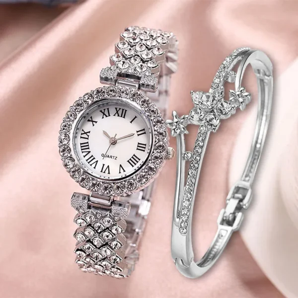 Silver rhinestone watch with matching bracelet.