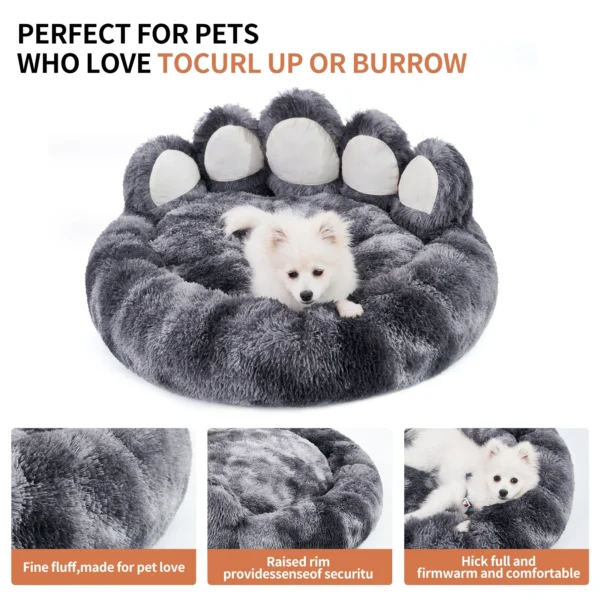 Gray paw print pet bed with dog.