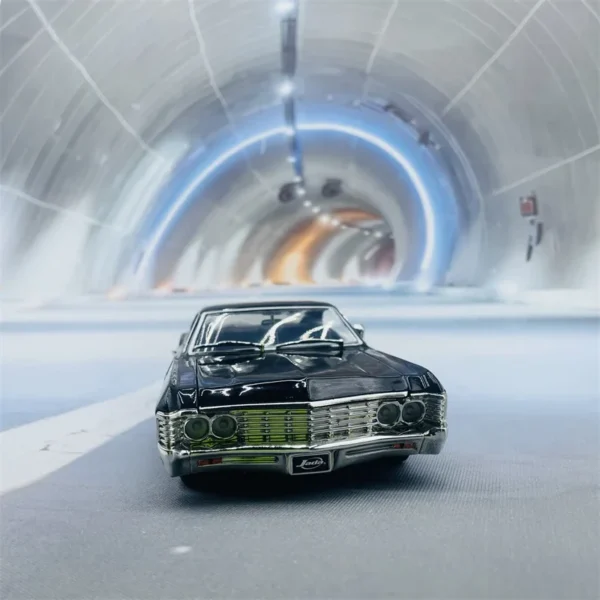 Black car in a tunnel.