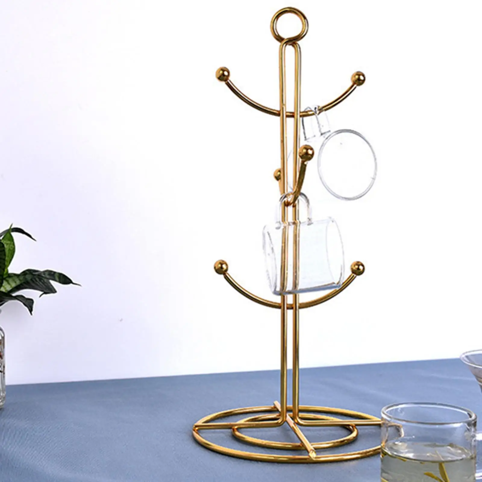 Gold metal mug and cup drying rack.