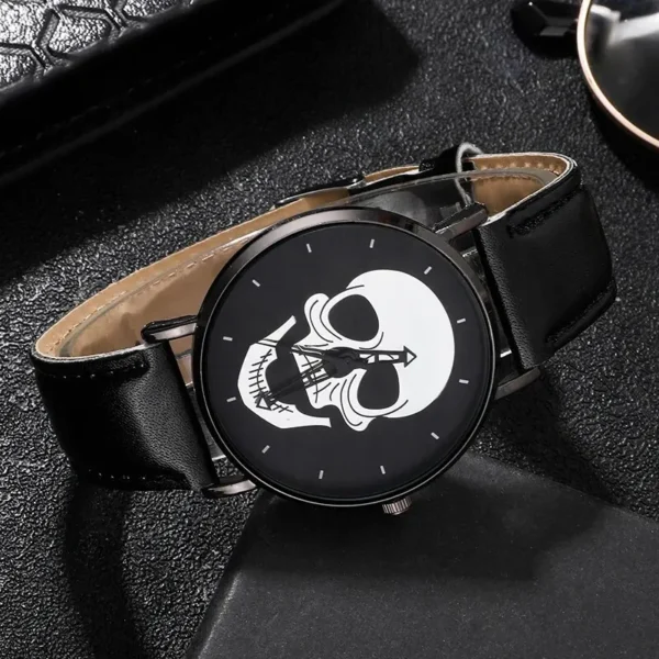 Black wristwatch with white skull face.