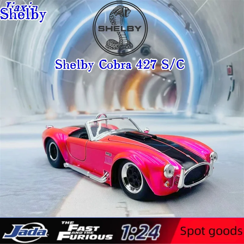 Pink Shelby Cobra 427 S/C diecast model car.