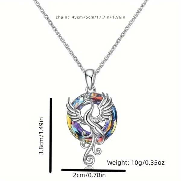 Silver phoenix necklace with rainbow crystal.