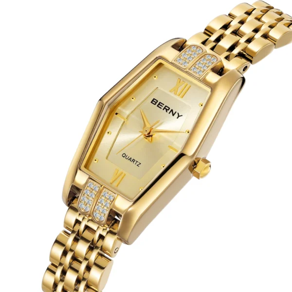 Gold watch with diamond accents.