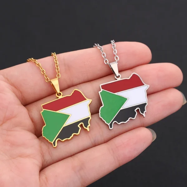 Two Sudanese flag necklaces on hand.