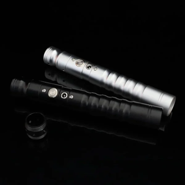 Two lightsaber hilts, black and silver.