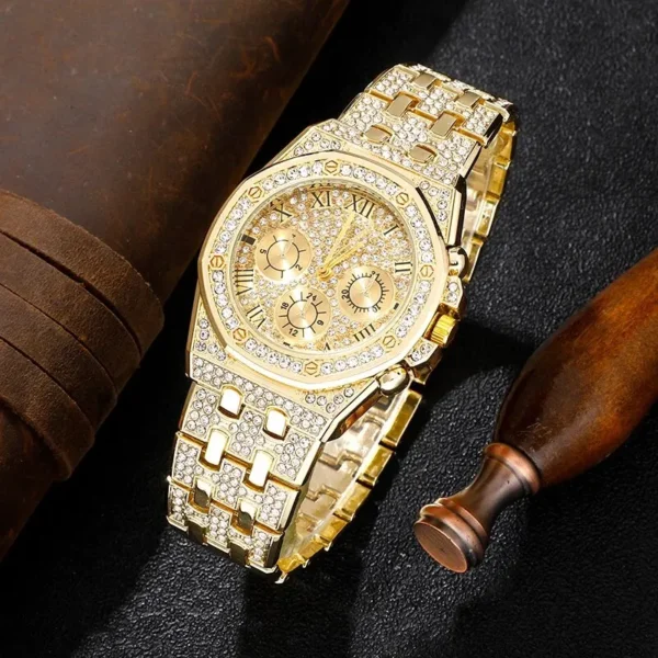 Gold watch with diamond accents.