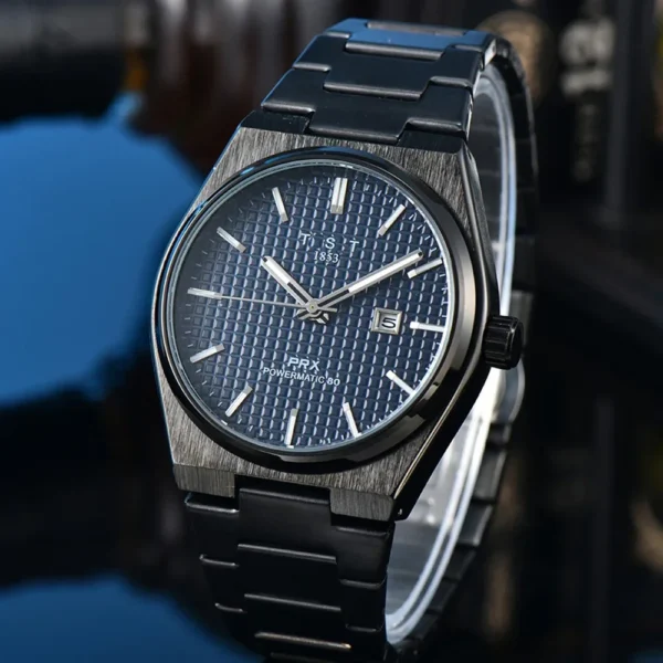 Black Tissot wristwatch with blue face.