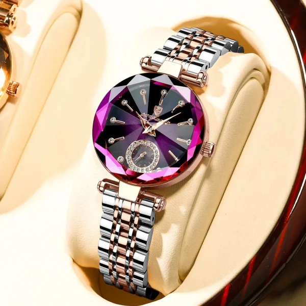 Rose gold watch with a purple face.