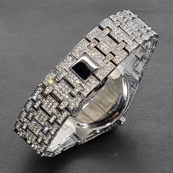 Silver and diamond iced out watch.