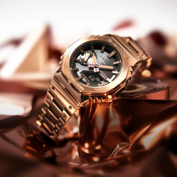 Rose gold G-Shock watch on foil.