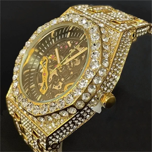 Gold watch with diamond accents.