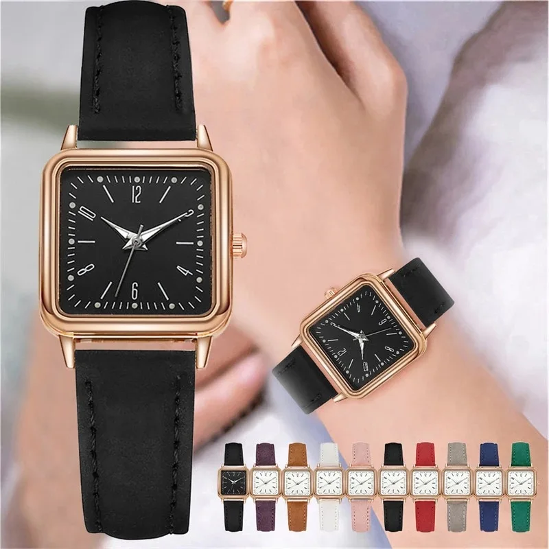 Black leather square watch with gold trim.