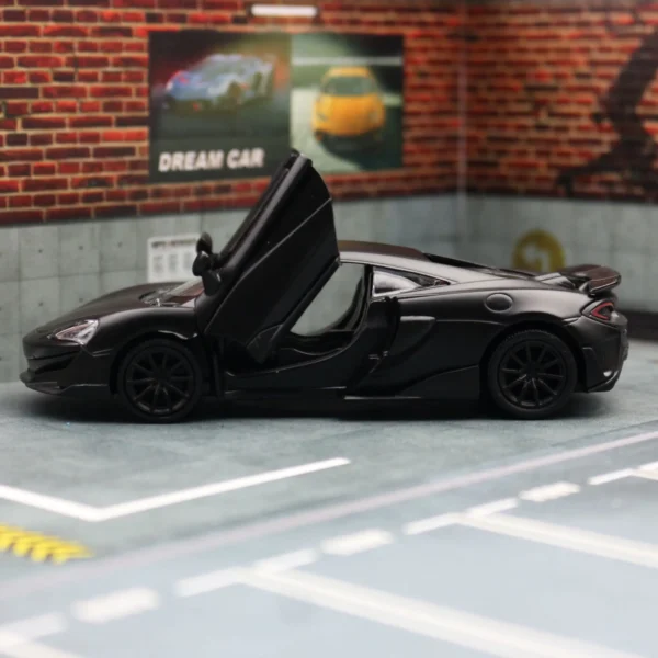 Black toy car with doors open.