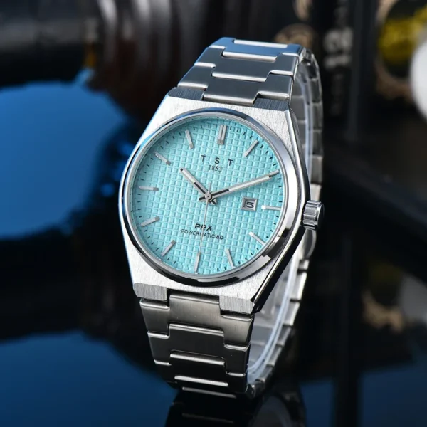 Silver wristwatch with blue face.