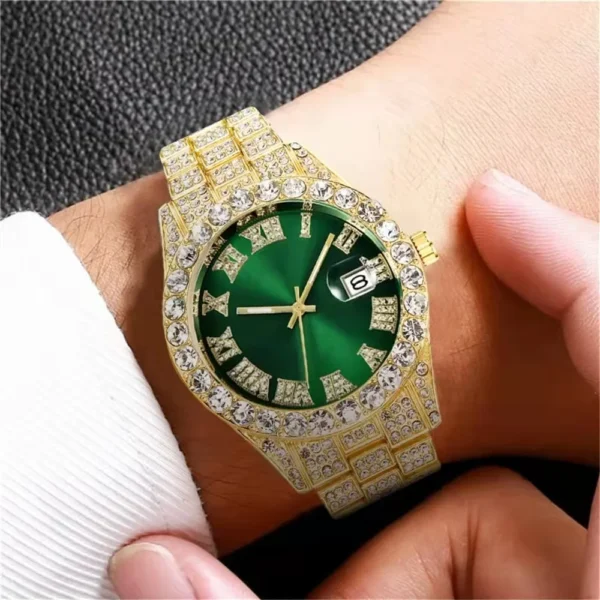 Gold watch with green face and diamonds.