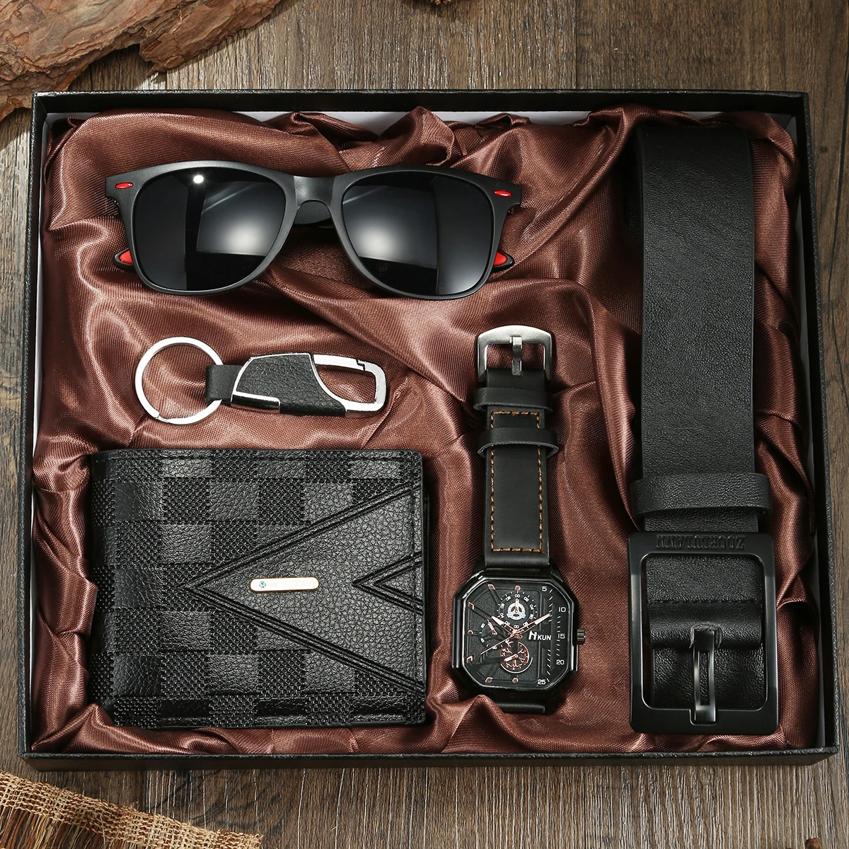 Men's gift set with watch, wallet, sunglasses, and belt.