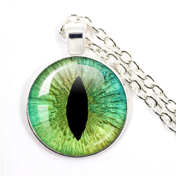 Green eye pendant on silver chain.