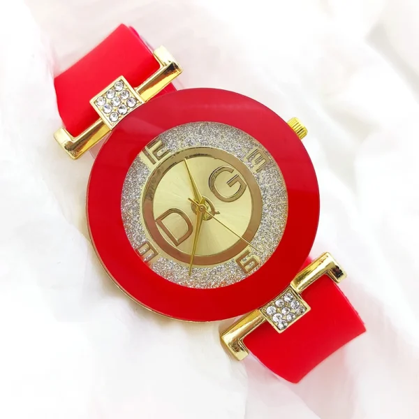 Red and gold wristwatch with DG logo.