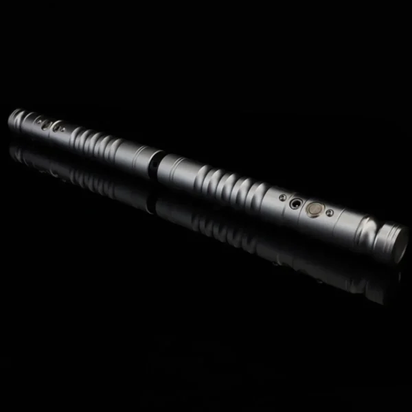 Silver lightsaber hilt on black background.