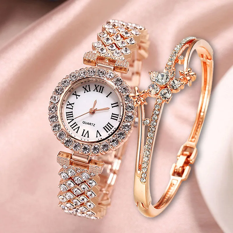 Gold watch with crystal bracelet.