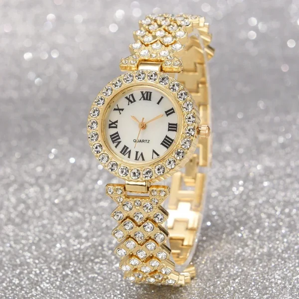 Gold rhinestone analog watch with Roman numerals.