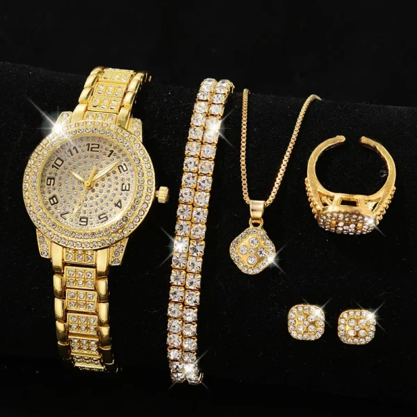 Gold watch, bracelet, necklace, ring, earrings.