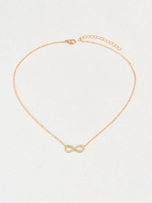 Gold infinity necklace with diamonds.