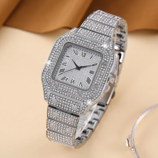 Silver diamond-encrusted wristwatch with Roman numerals.