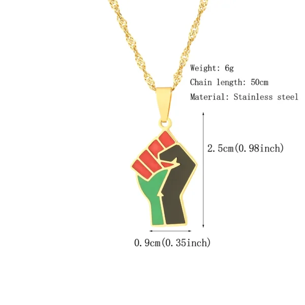 Gold chain necklace with raised fist pendant.