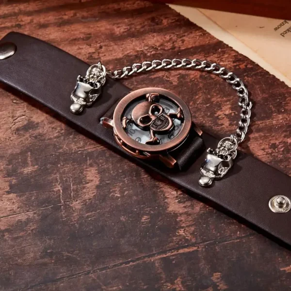 Leather wristwatch with skull and chain.