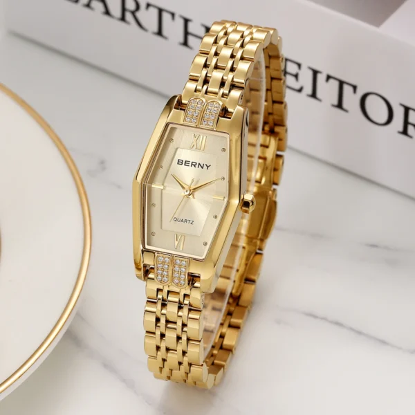 Gold Berny quartz wristwatch with diamonds.