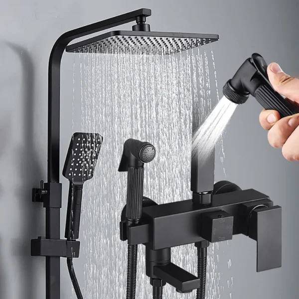 Black shower system with handheld sprayer.