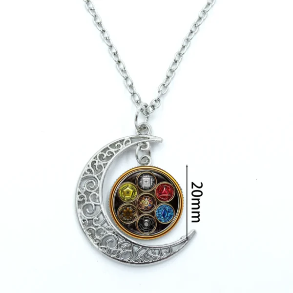 Silver crescent moon necklace with colorful pendant.