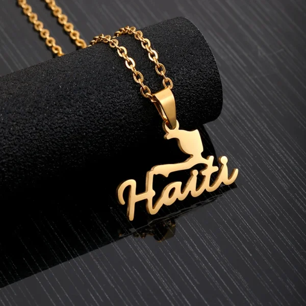 Gold Haiti necklace with map pendant.