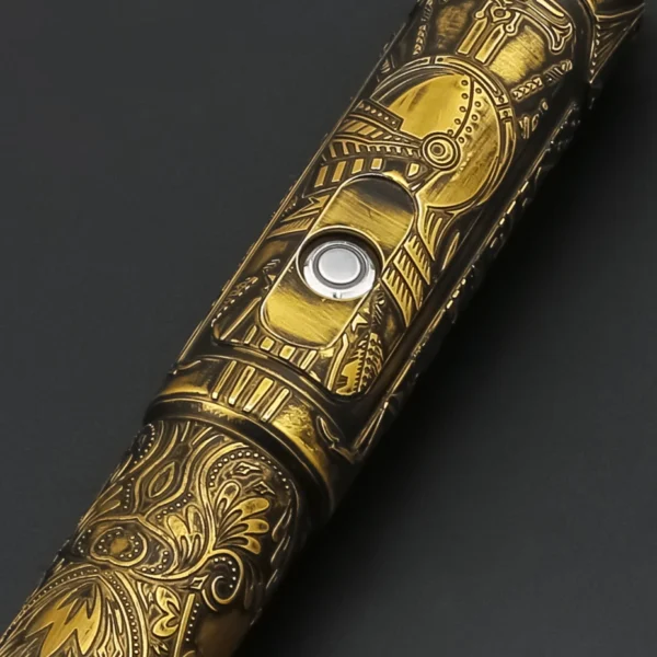 Gold engraved pen with button.