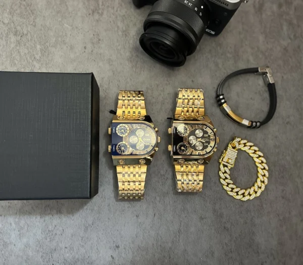 Two gold watches with black faces.