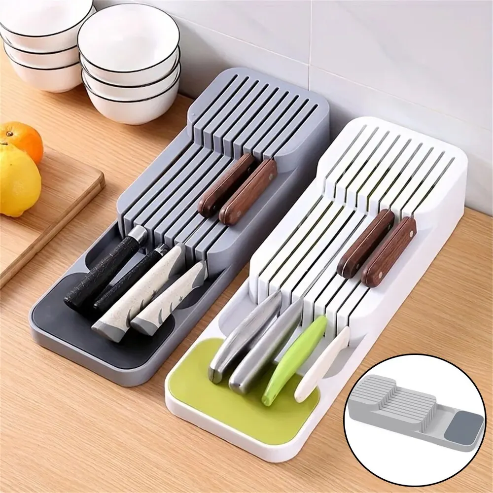 Grey and white knife holder with blades.