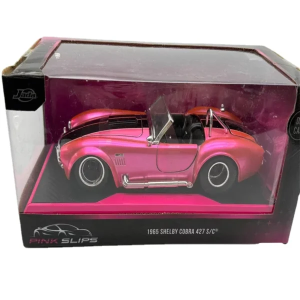 Pink 1965 Shelby Cobra 427 S/C diecast car.