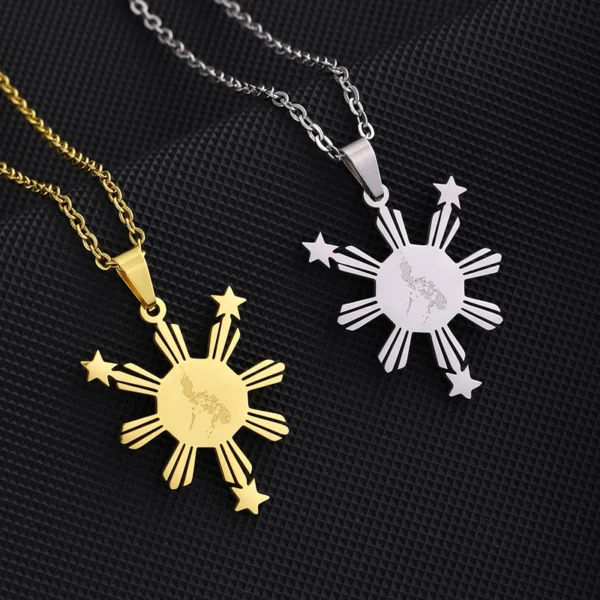 Gold and silver Philippine sun pendant necklaces.