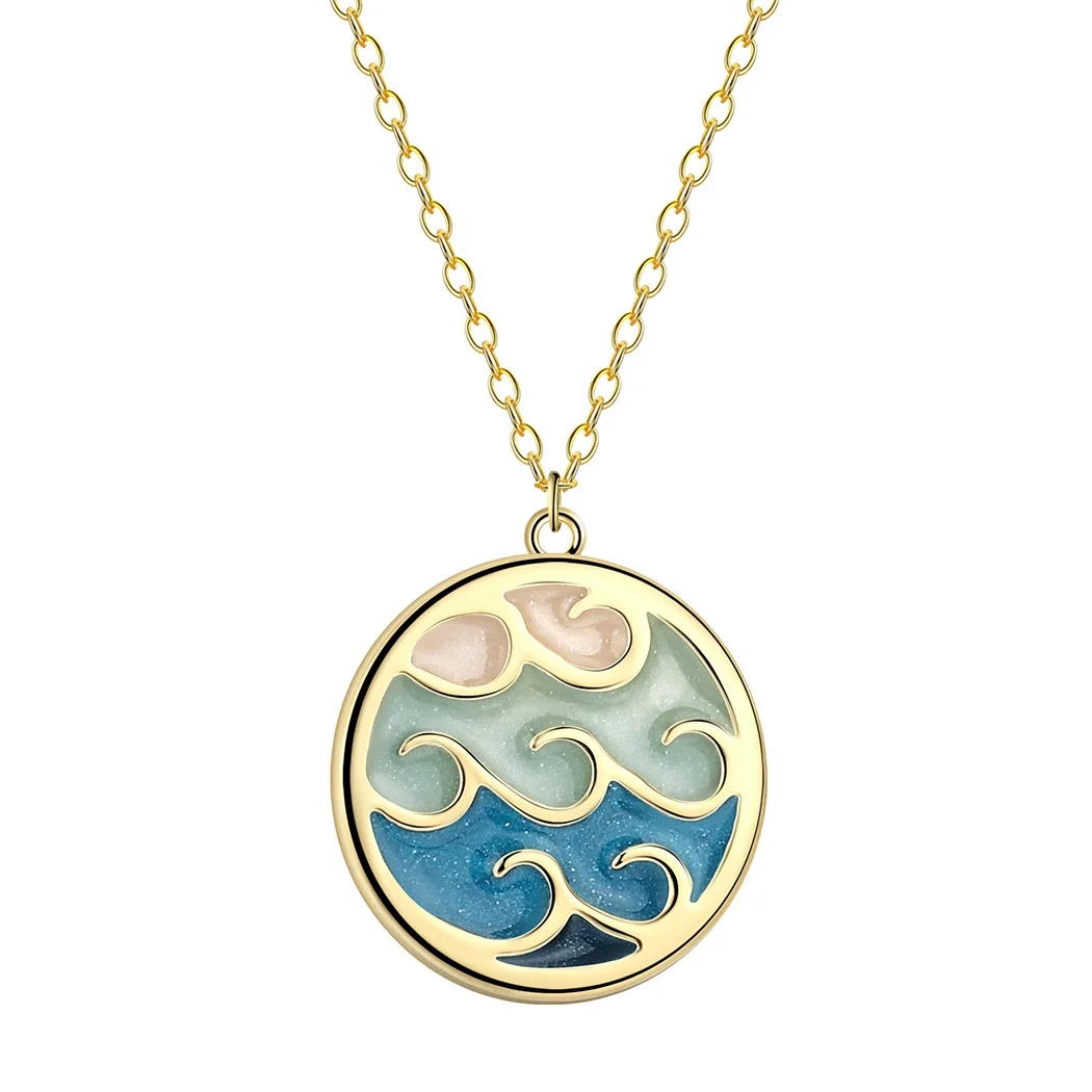 Gold necklace with blue wave pendant.