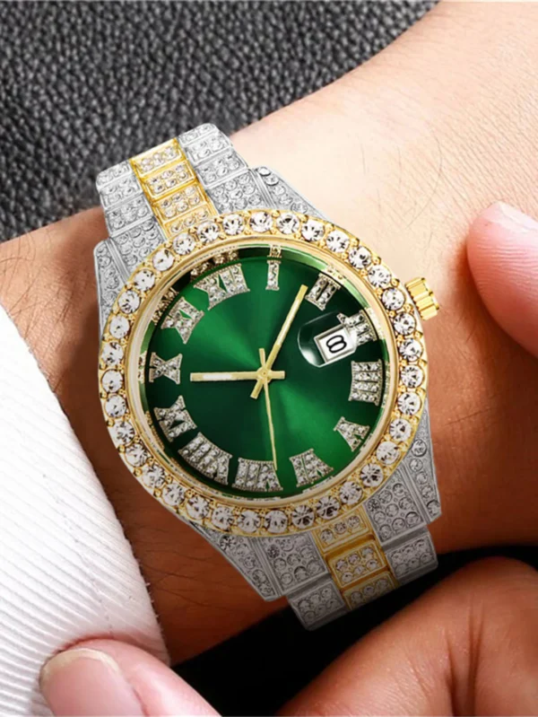 Green dial diamond wristwatch on wrist.