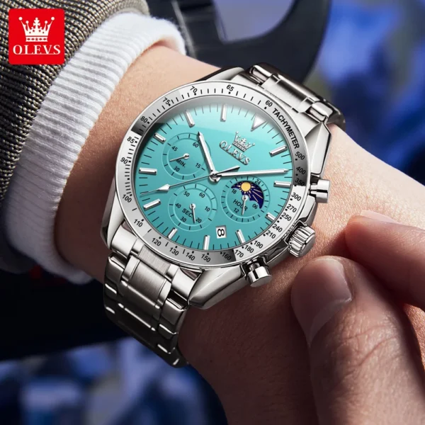 Silver chronograph wristwatch with blue face.